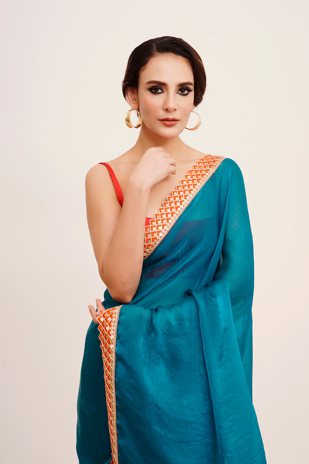 Teal Sequinned Chiffon Saree With Blouse