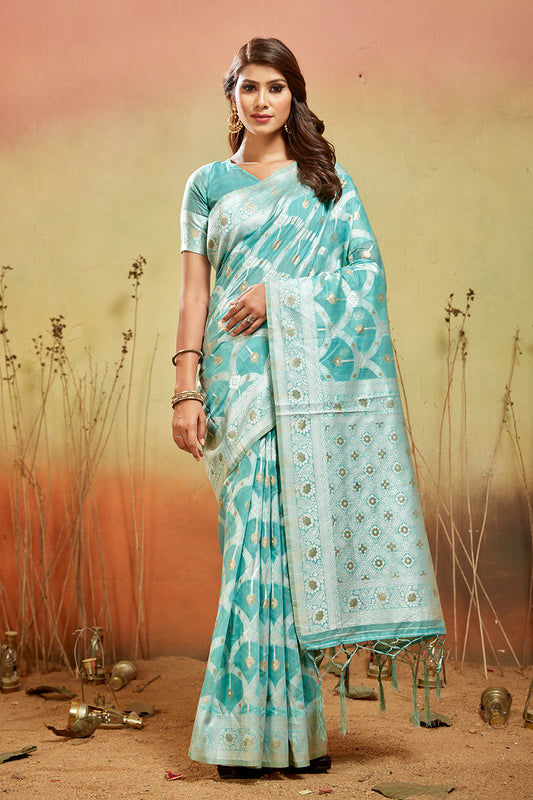 Sea green organza saree with silver zari detail