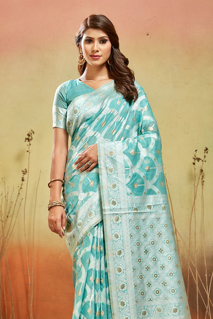 Sea green organza saree with silver zari detail